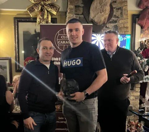 Image of presentation of player of the year.